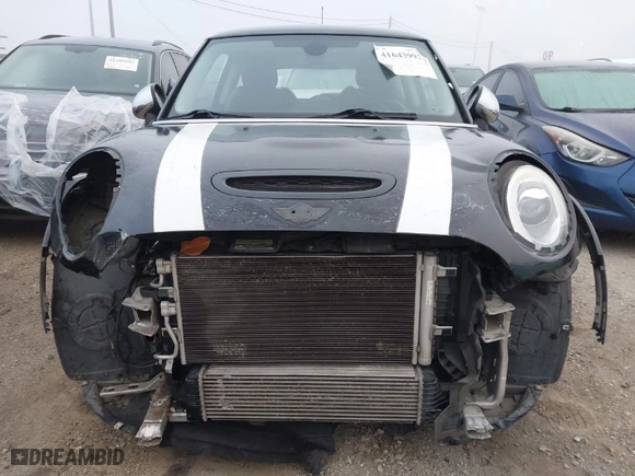 2014 MINI Cooper Hardtop S with VIN WMWXM7C59ET970371, listed as a IAAI auction lot 41643992 with NaN miles. Bid and sale history available at carsss.com. Image 12.