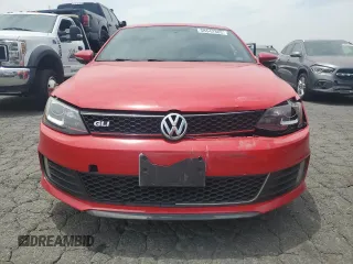 2014 Volkswagen Jetta GLI with VIN 3VW4T7AJ0EM318615, listed as a Copart auction lot 58542385 with 211,879 mi miles and Salvage title. Bid and sale history available at DreamBid. Image 5.