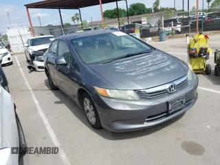 2012 Honda Civic Sdn LX with VIN 19XFB2F58CE370319, listed as a IAAI auction lot 42036096 with 153,562 mi miles. Bid and sale history available at carsss.com. Image 1.