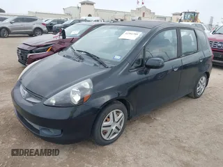2007 Honda Fit z VIN JHMGD38437S010479, wystawiony jako IAAI lot #42302388 z przebiegiem 245 945 mil mil oraz . Historia ofert i sprzedaży dostępna na DreamBid. Obrazek 2.