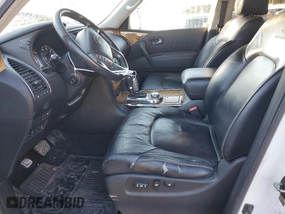 2012 Infiniti QX56 7-passenger with VIN JN8AZ2NE1C9021857, listed as a Copart auction lot 76967164 with 153,958 mi miles and Salvage Title. Bid and sale history available at carsss.com. Image 7.