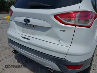2015 Ford Escape SE with VIN 1FMCU0G74FUB88670, listed as a IAAI auction lot 42115919 with 129,969 mi miles. Bid and sale history available at carsss.com. Image 6.
