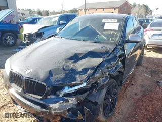2017 BMW X4 M40i with VIN 5UXXW7C54H0U25941, listed as a IAAI auction lot 41366060 with 68,784 mi miles. Bid and sale history available at carsss.com. Image 2.