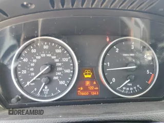 2012 BMW X5 35d z VIN 5UXZW0C59CL670242, wystawiony jako Copart lot #57638165 z przebiegiem 174 430 mil mil oraz Szkoda całkowita • Salvage title. Historia ofert i sprzedaży dostępna na DreamBid. Obrazek 9.