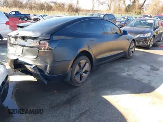 2020 Tesla Model 3 Standard Range Plus with VIN 5YJ3E1EA4LF745491, listed as a IAAI auction lot 41186726 with 74,575 mi miles and . Bid and sale history available at DreamBid. Image 4.