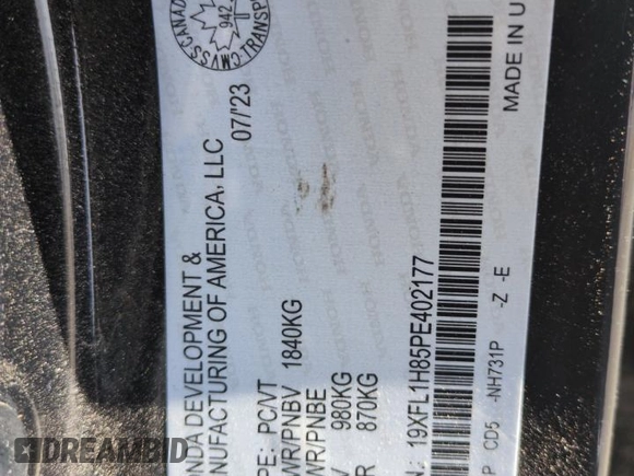 2023 Honda Civic Sport Touring z VIN 19XFL1H85PE402177, wystawiony jako Copart lot #52611605 z przebiegiem 56 306 mil mil oraz Szkoda całkowita • Salvage title. Historia ofert i sprzedaży dostępna na DreamBid. Obrazek 13.