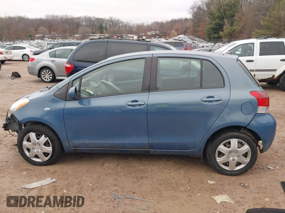 2009 Toyota Yaris with VIN JTDKT903195255240, listed as a IAAI auction lot 41650800 with 168,991 mi miles. Bid and sale history available at carsss.com. Image 14.