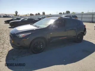 2024 Subaru Crosstrek Wilderness с VIN 4S4GUHU66R3818100, выставлен на аукционе Copart как лот 55357175 с пробегом 11 601 миль миль и Списание • Salvage title. История ставок и продаж доступна на DreamBid. Изображение 1.