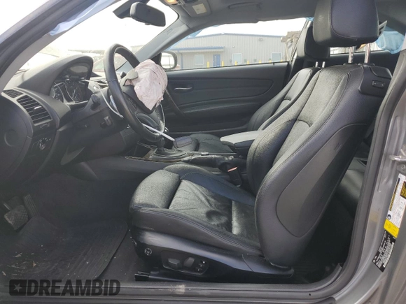 2012 BMW 1 Series 128i with VIN WBAUP9C57CVL91337, listed as a Copart auction lot 76144404 with 87,093 mi miles and Salvage title. Bid and sale history available at DreamBid. Image 7.