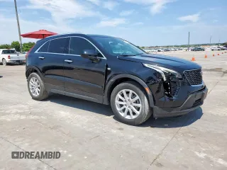 2023 Cadillac XT4 FWD Luxury z VIN 1GYAZAR42PF102696, wystawiony jako Copart lot #60524065 z przebiegiem 1 903 mil mil oraz Szkoda całkowita • Salvage title. Historia ofert i sprzedaży dostępna na DreamBid. Obrazek 4.