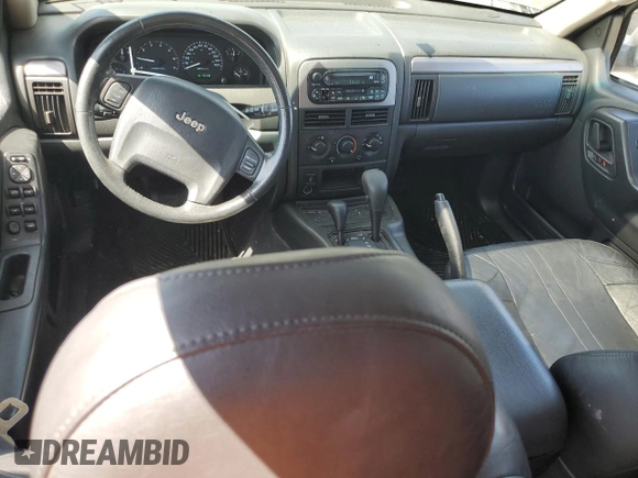 2004 Jeep Grand Cherokee Laredo with VIN 1J4GW48S84C182135, listed as a Copart auction lot 62224975 with 187,938 mi miles and Clean title. Bid and sale history available at DreamBid. Image 8.