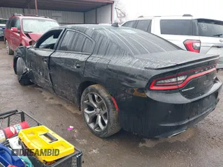 2015 Dodge Charger SXT z VIN 2C3CDXHG3FH754224, wystawiony jako IAAI lot #41527488 z przebiegiem 162 116 mil mil oraz . Historia ofert i sprzedaży dostępna na DreamBid. Obrazek 3.