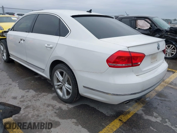 2014 Volkswagen Passat TDI SEL Premium with VIN 1VWCN7A32EC035738, listed as a IAAI auction lot 41641843 with 151,159 mi miles. Bid and sale history available at carsss.com. Image 3.