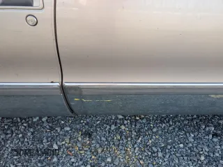 1995 Cadillac Fleetwood z VIN 1G6DW52P7SR706309, wystawiony jako Copart lot #76416794 z przebiegiem Nie podano mil oraz Szkody całkowita. Historia ofert i sprzedaży dostępna na DreamBid. Obrazek 12.