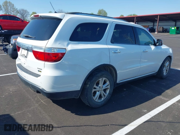 2013 Dodge Durango Crew with VIN 1C4RDJDG0DC670810, listed as a IAAI auction lot 41974024 with 209,379 mi miles and . Bid and sale history available at DreamBid. Image 4.