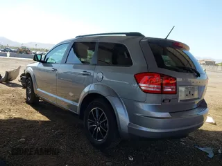 2017 Dodge Journey SE with VIN 3C4PDCABXHT586922, listed as a IAAI auction lot 41711047 with 114,118 mi miles and . Bid and sale history available at DreamBid. Image 3.