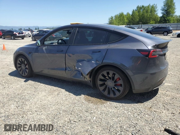2022 Tesla Model Y Performance with VIN 7SAYGDEF3NF384161, listed as a Copart auction lot 59989145 with 12,731 mi miles and Salvage title. Bid and sale history available at DreamBid. Image 2.