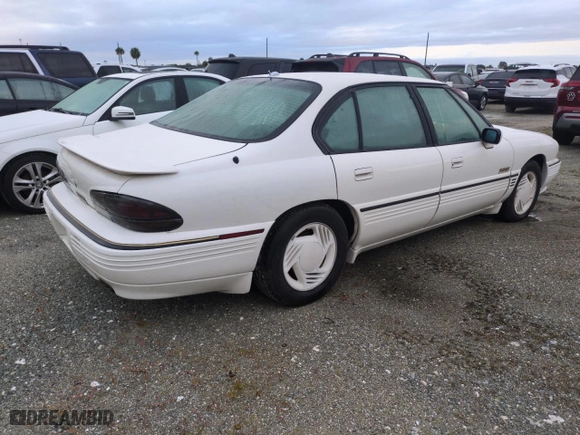 1992 Pontiac Bonneville SSE with VIN 1G2HZ52L5N1321549, listed as a Copart auction lot 74715344 with 0 mi miles and Non Repairable. Bid and sale history available at carsss.com. Image 3.