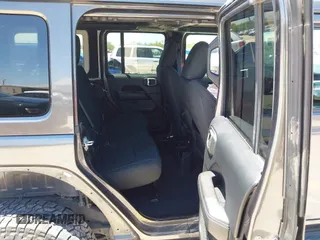 2018 Jeep Wrangler Unlimited Sahara with VIN 1C4HJXEN1JW236779, listed as a IAAI auction lot 42238158 with 72,879 mi miles and . Bid and sale history available at DreamBid. Image 8.