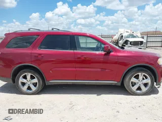 2013 Dodge Durango SXT with VIN 1C4RDHAG6DC683865, listed as a IAAI auction lot 42615546 with 113,545 mi miles and . Bid and sale history available at DreamBid. Image 13.