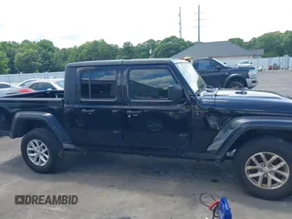2023 Jeep Gladiator Sport S with VIN 1C6HJTAGXPL543319, listed as a IAAI auction lot 42499587 with 45,140 mi miles and . Bid and sale history available at DreamBid. Image 13.