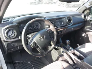 2023 Toyota Tacoma SR5 z VIN 3TMAZ5CNXPM208862, wystawiony jako IAAI lot #42206860 z przebiegiem 11 354 mil mil oraz . Historia ofert i sprzedaży dostępna na DreamBid. Obrazek 22.