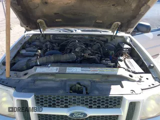 2001 Ford Explorer Sport z VIN 1FMYU60E71UC52372, wystawiony jako IAAI lot #41739367 z przebiegiem 137 960 mil mil oraz . Historia ofert i sprzedaży dostępna na DreamBid. Obrazek 10.