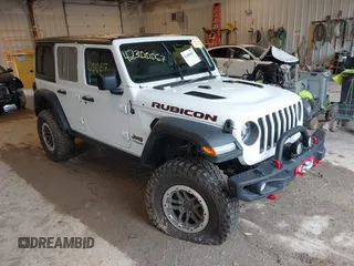 2022 Jeep Wrangler Unlimited Rubicon z VIN 1C4JJXFM0NW154202, wystawiony jako IAAI lot #42400067 z przebiegiem 60 486 mil mil oraz . Historia ofert i sprzedaży dostępna na DreamBid. Obrazek 1.