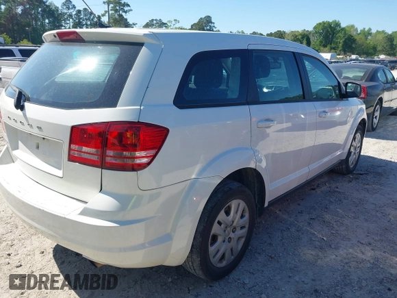 2015 Dodge Journey American Value Pkg with VIN 3C4PDCAB5FT537950, listed as a IAAI auction lot 42042471 with 198,881 mi miles. Bid and sale history available at carsss.com. Image 4.