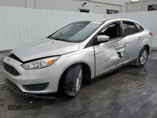 2018 Ford Focus SE z VIN 1FADP3F29JL272804, wystawiony jako Copart lot #49612625 z przebiegiem Nie podano mil oraz Tytuł czysty. Historia ofert i sprzedaży dostępna na DreamBid. Obrazek 1.