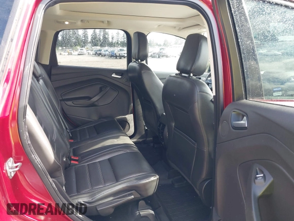 2018 Ford Escape Titanium with VIN 1FMCU9J99JUB44963, listed as a IAAI auction lot 42293113 with 68,803 mi miles and . Bid and sale history available at DreamBid. Image 8.