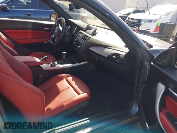 2014 BMW 2 Series M235i with VIN WBA1J7C51EVX33702, listed as a IAAI auction lot 41713337 with 83,076 mi miles. Bid and sale history available at carsss.com. Image 5.