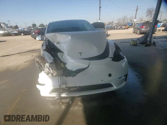 2022 Tesla Model Y Performance with VIN 7SAYGDEF8NF381644, listed as a Copart auction lot 44554585 with 71,413 mi miles and Salvage Title. Bid and sale history available at DreamBid. Image 11.