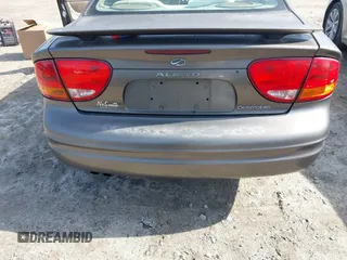 2002 Oldsmobile Alero GL1 z VIN 1G3NL52E82C172314, wystawiony jako IAAI lot #41465789 z przebiegiem 118 427 mil mil oraz . Historia ofert i sprzedaży dostępna na DreamBid. Obrazek 6.