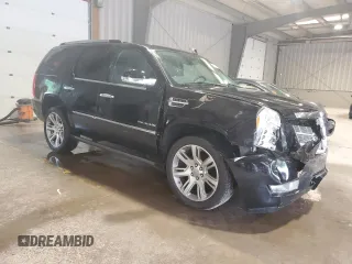 2012 Cadillac Escalade Platinum Edition z VIN 1GYS4DEF3CR241773, wystawiony jako Copart lot #57862395 z przebiegiem 134 009 mil mil oraz Szkoda całkowita • Salvage title. Historia ofert i sprzedaży dostępna na DreamBid. Obrazek 4.