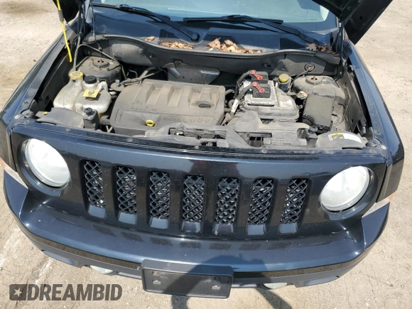 2014 Jeep Patriot Latitude with VIN 1C4NJRFB3ED761587, listed as a Copart auction lot 60554245 with 138,763 mi miles and Salvage title. Bid and sale history available at DreamBid. Image 12.