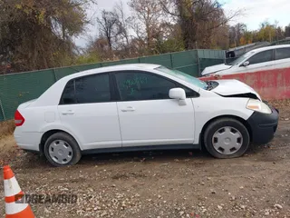2009 Nissan Versa 1.8 S with VIN 3N1BC11E49L416720, listed as a IAAI auction lot 40960069 with 130,131 mi miles. Bid and sale history available at carsss.com. Image 13.
