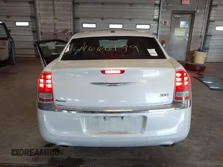 2014 Chrysler 300 with VIN 2C3CCAAGXEH217715, listed as a IAAI auction lot 41666179 with 145,744 mi miles and . Bid and sale history available at DreamBid. Image 16.