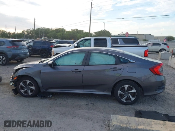 2019 Honda Civic Sedan LX with VIN 19XFC2F60KE018100, listed as a IAAI auction lot 41908486 with 124,357 mi miles. Bid and sale history available at carsss.com. Image 14.