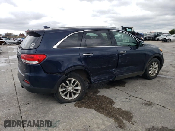 2016 Kia Sorento LX with VIN 5XYPG4A31GG074106, listed as a Copart auction lot 52039495 with 124,645 mi miles and Salvage Title. Bid and sale history available at DreamBid. Image 3.