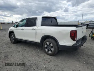 2019 Honda Ridgeline RTL-E with VIN 5FPYK3F74KB039057, listed as a Copart auction lot 57350525 with 105,102 mi miles and Salvage title. Bid and sale history available at DreamBid. Image 2.