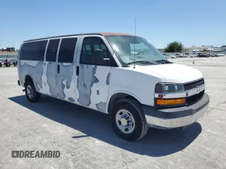 2007 Chevrolet Express Passenger z VIN 1GAHG39U971146710, wystawiony jako Copart lot #57608615 z przebiegiem 30 565 mil mil oraz Szkoda całkowita • Salvage title. Historia ofert i sprzedaży dostępna na DreamBid. Obrazek 4.