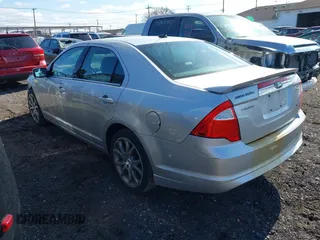 2012 Ford Fusion SEL with VIN 3FAHP0JA9CR388085, listed as a IAAI auction lot 41853893 with 174,008 mi miles. Bid and sale history available at carsss.com. Image 3.