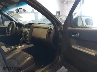2008 Mercury Mariner with VIN 4M2CU81158KJ14013, listed as a IAAI auction lot 41305863 with 229,672 mi miles. Bid and sale history available at carsss.com. Image 5.