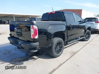 2022 GMC Canyon 2WD Elevation with VIN 1GTG5CEN5N1151794, listed as a IAAI auction lot 41876656 with 57,305 mi miles. Bid and sale history available at carsss.com. Image 4.