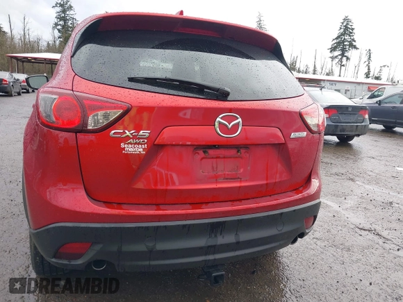 2015 Mazda CX-5 Grand Touring with VIN JM3KE4DY0F0479392, listed as a IAAI auction lot 41659415 with 141,403 mi miles. Bid and sale history available at carsss.com. Image 16.