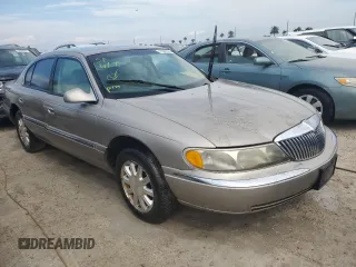 2001 Lincoln Continental with VIN 1LNHM97V71Y711366, listed as a Copart auction lot 75245564 with 0 mi miles and Non Repairable. Bid and sale history available at carsss.com. Image 4.