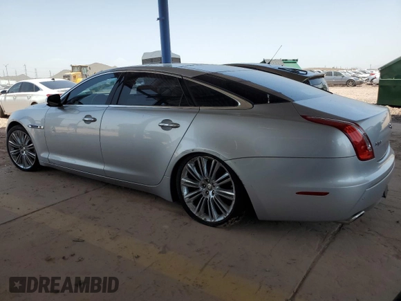 2012 Jaguar XJ Supercharged with VIN SAJWA2GE1CMV28584, listed as a Copart auction lot 63313275 with 74,023 mi miles and Clean title. Bid and sale history available at DreamBid. Image 2.