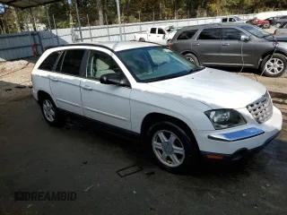 2004 Chrysler Pacifica Touring with VIN 2C4GM68464R600935, listed as a Copart auction lot 79678084 with 160,576 mi miles and Salvage Title. Bid and sale history available at DreamBid. Image 4.