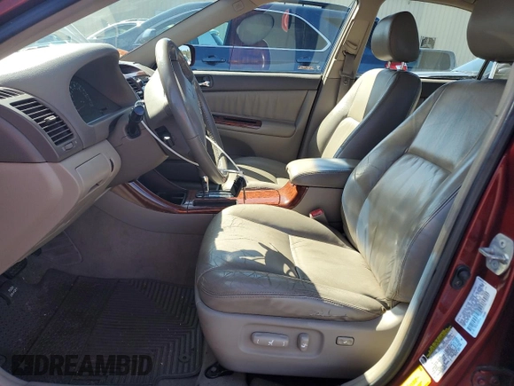 2004 Toyota Camry LE with VIN 4T1BE30KX4U297754, listed as a Copart auction lot 50795425 with 184,152 mi miles and Salvage Title. Bid and sale history available at DreamBid. Image 7.